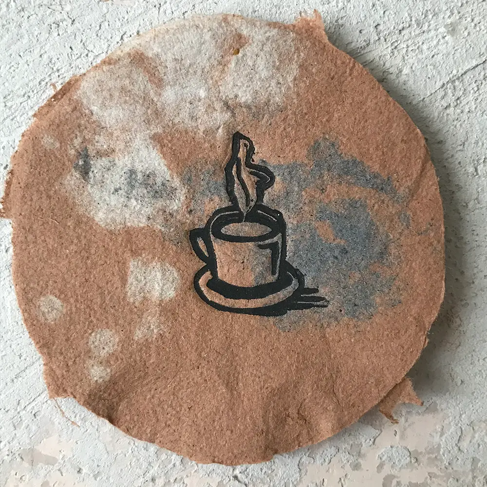 mini coffee cup linoprint printed by Ronja Hollkott on handmade paper